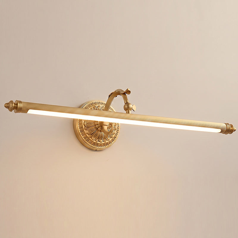 The wide Ellesmere sconce installed above a living room console table.