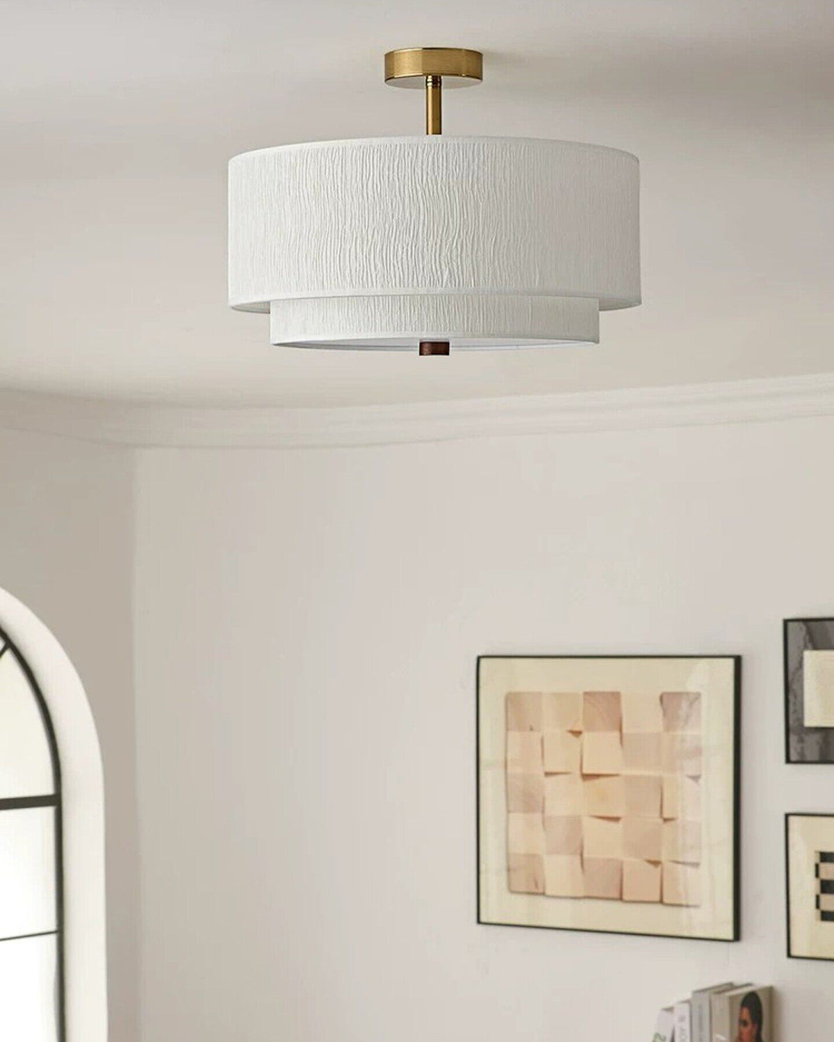 The Elodie semi-flush mount in a hallway, showcasing its suitability for low ceilings.