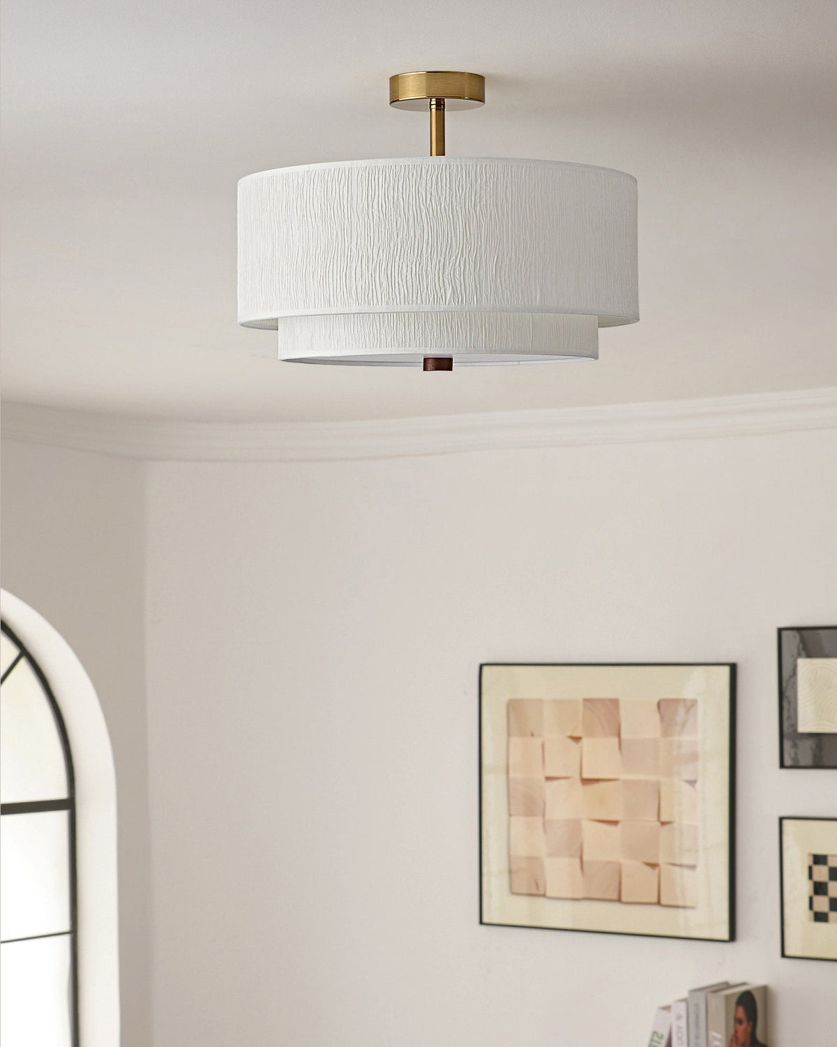 Close-up on the brushed brass canopy.