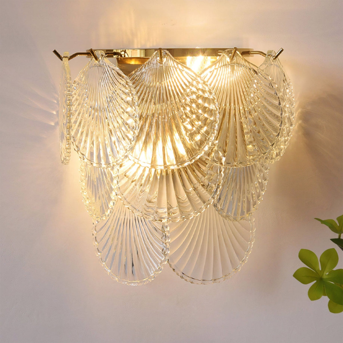 Close-up of the Galerie Wall Lamp's intricate glass and metal details.