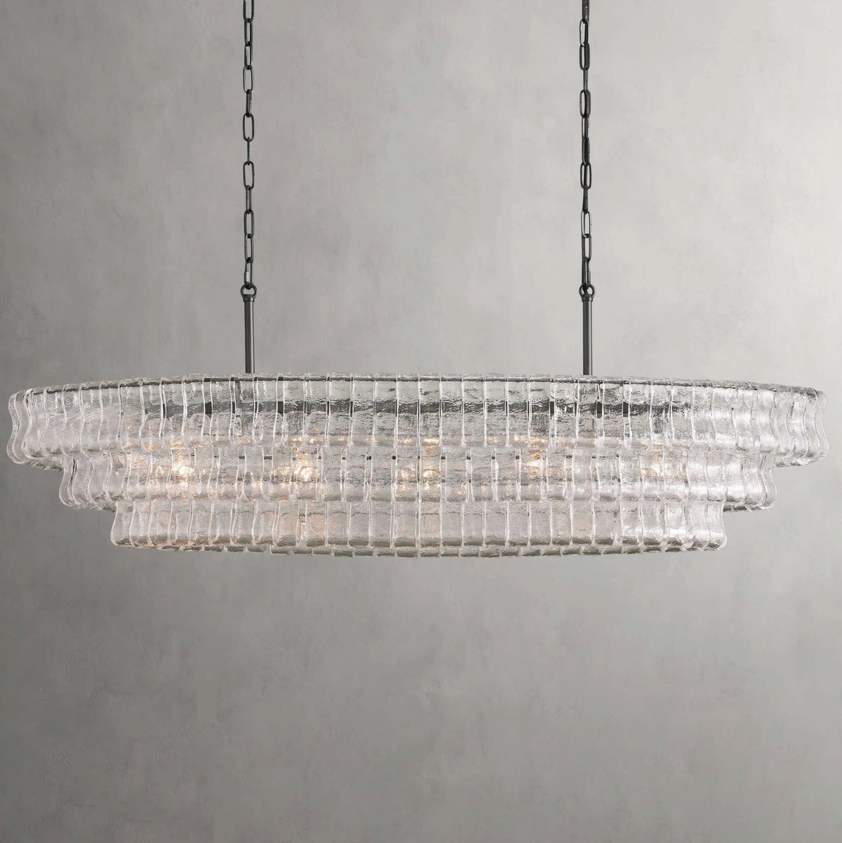The black glass Albano Chandelier, creating a bold statement.