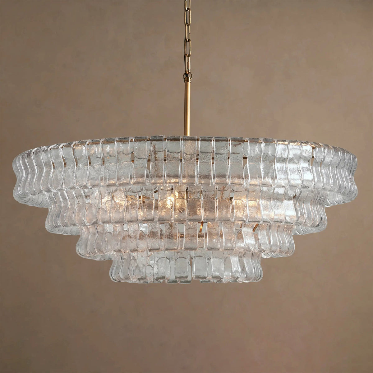Side view of the Ghiaccio Round Chandelier in a Smoke Grey finish.