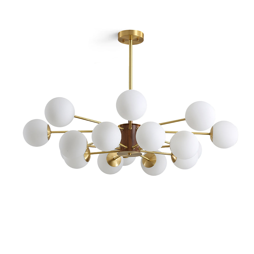 Gino Glass Chandelier with brass and wood accents in a modern living room.