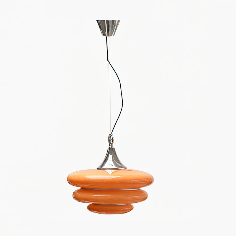 Another angle of the Gispen Orange Pendant Light in a home setting.