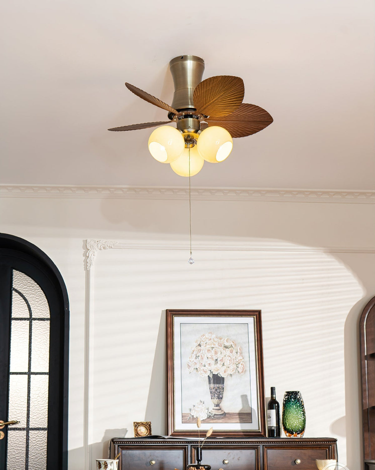 Glauk Ceiling Fan Light with Beige finish in a sunporch.