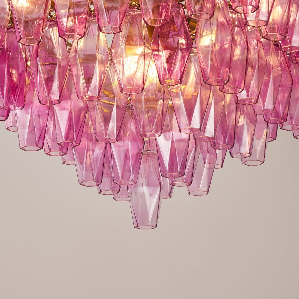 Close-up of an individual purple glass prism.