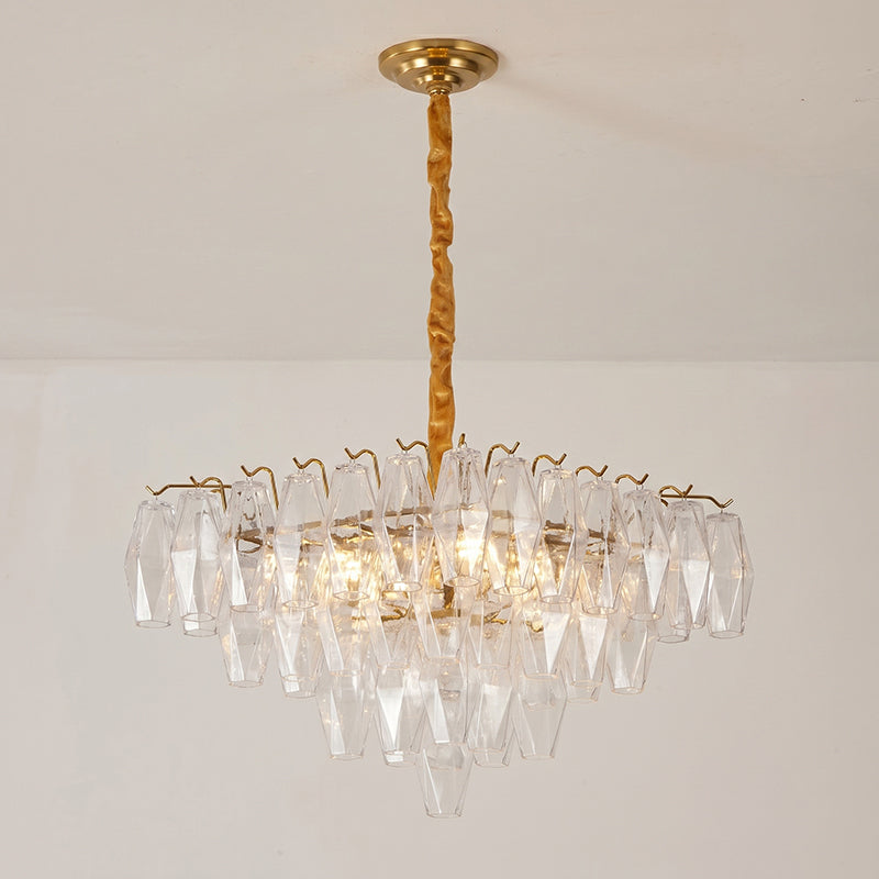 The chandelier hanging from its ceiling mount.