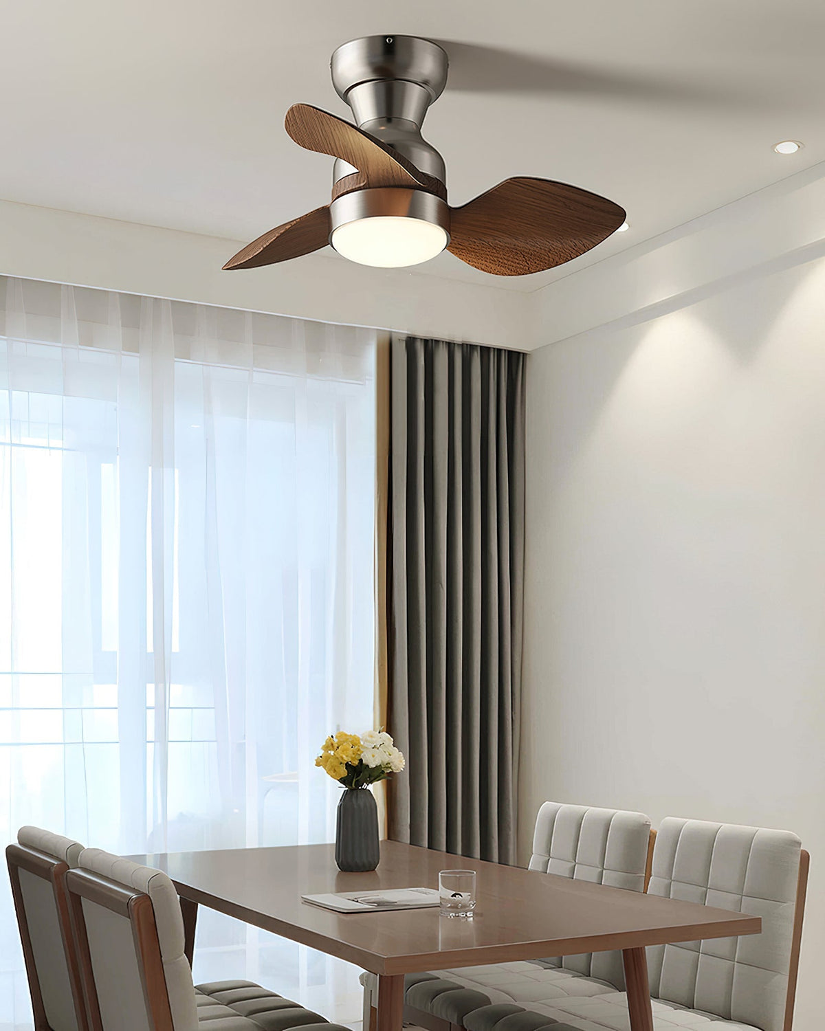 The walnut finish of the Haiku ceiling fan light.