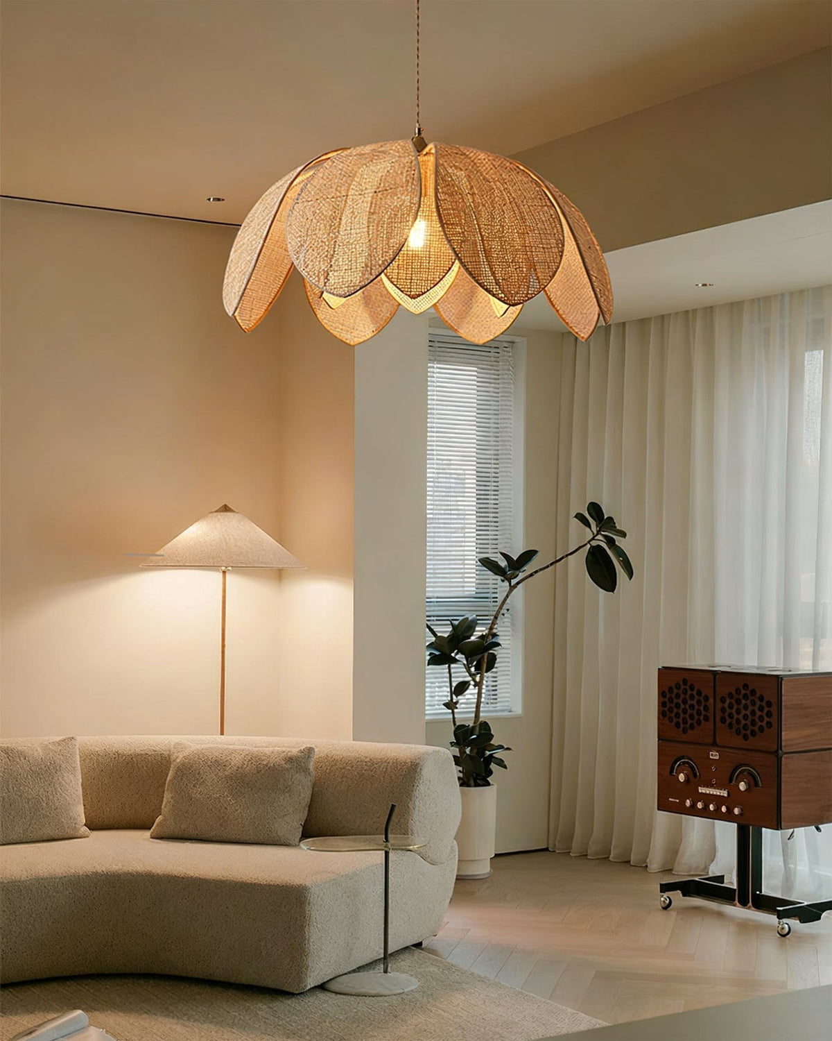 The Hanove Pendant Light casting a warm glow in a dining area.