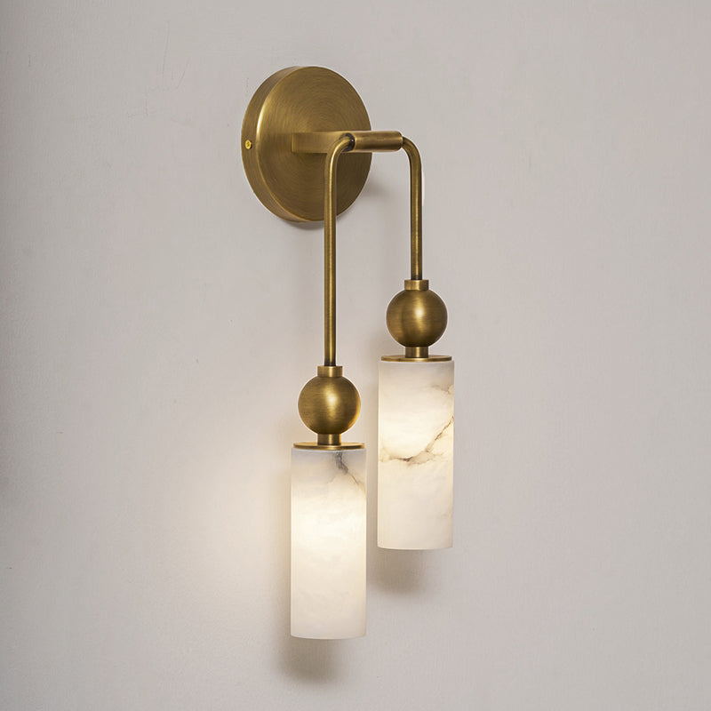 All three finishes (brass, black, nickel) of the Metro Alabaster Wall Lamp shown together.