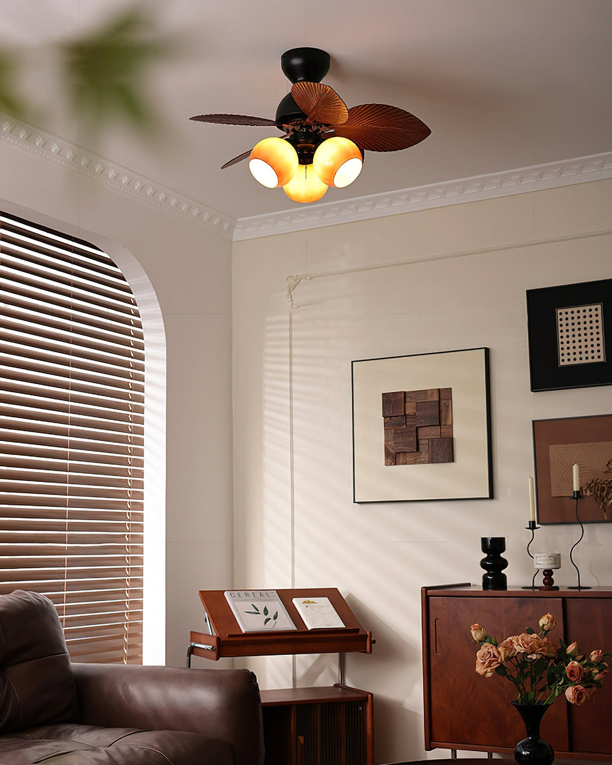 Belize Ceiling Fan Light in a caramel finish, highlighting its warm tones.