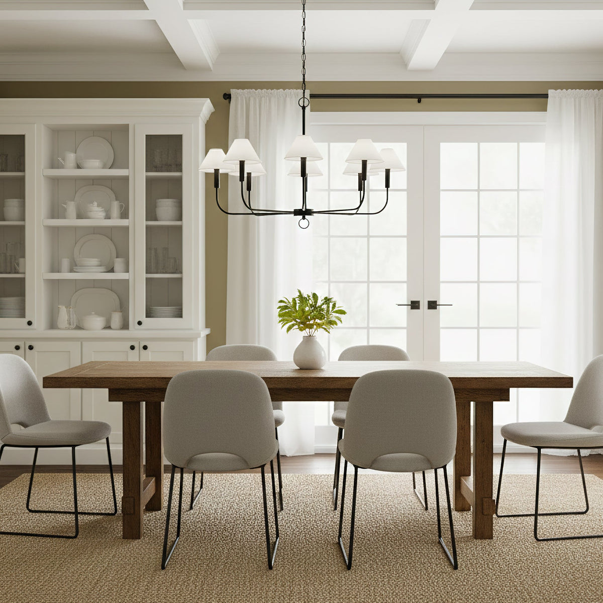 Close-up of a white fabric shade on the Henry Chandelier.
