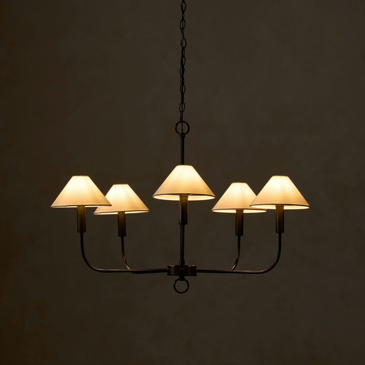 Lifestyle image of the Henry Chandelier in a dining area.
