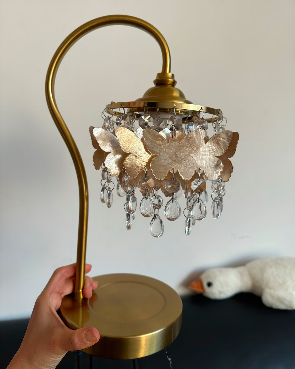 Detailed shot of the metal frame and cascading crystal drops.