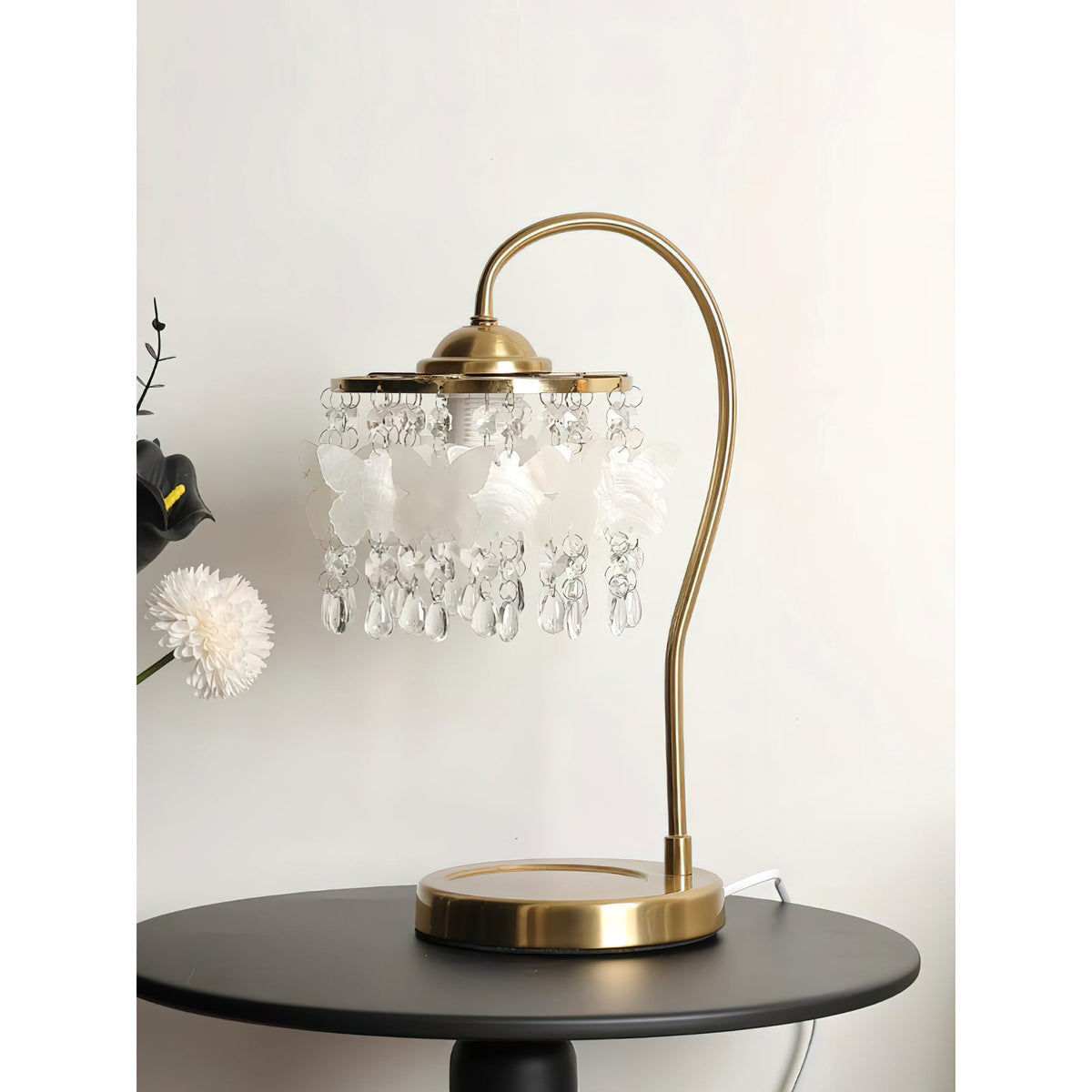 Top-down view of the Jasinski Table Lamp's shade with shell and crystal details.