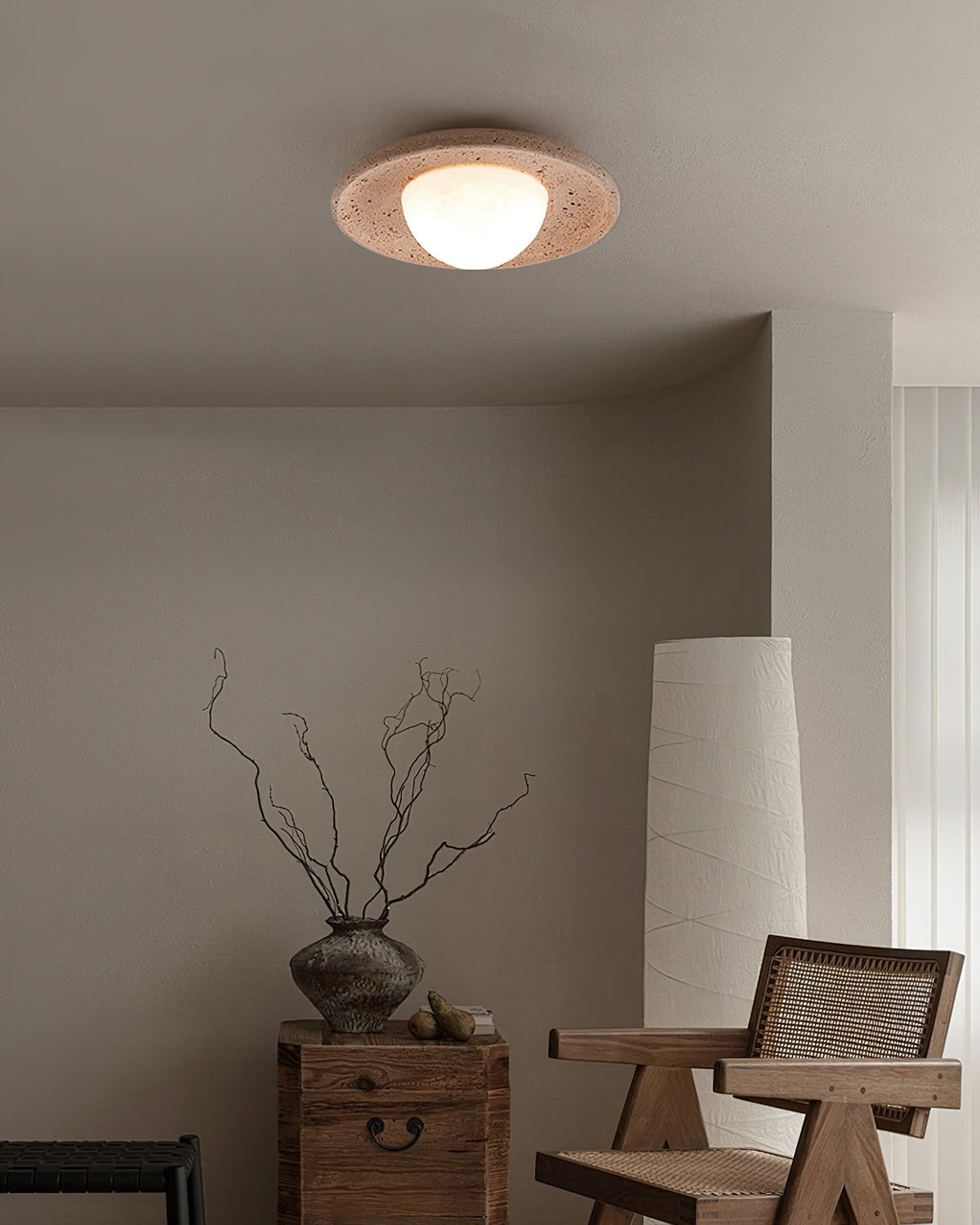 Detailed shot of the travertine material and smooth finish.