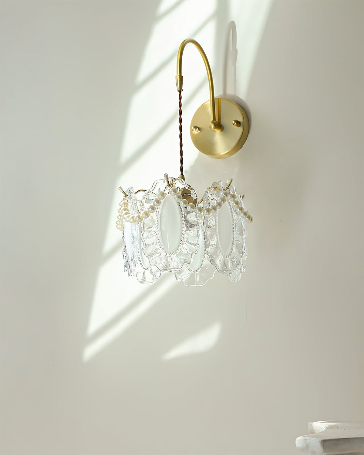 The Kano Wall Light with a white glass shade option.