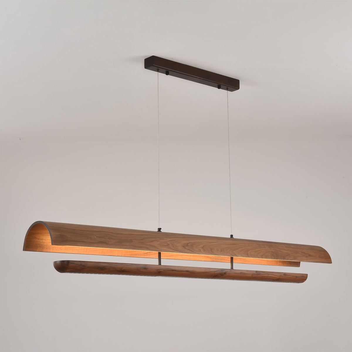 Angled view of the Kanoe Linear Chandelier highlighting its dual-layer structure.