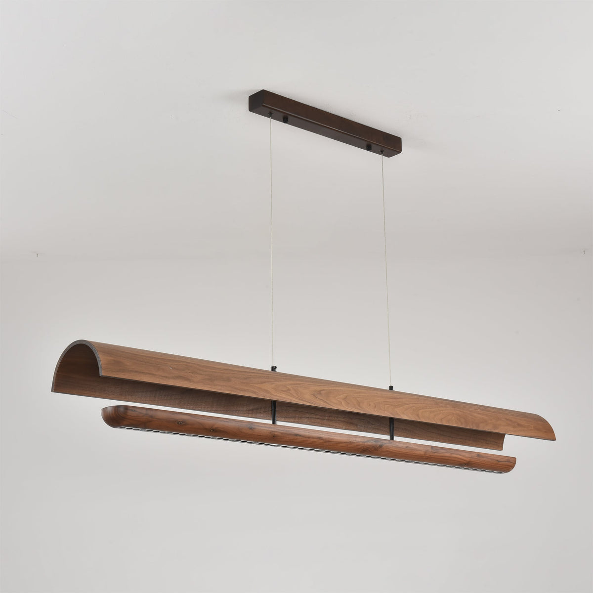 The Kanoe Linear Chandelier shown in its largest size option.