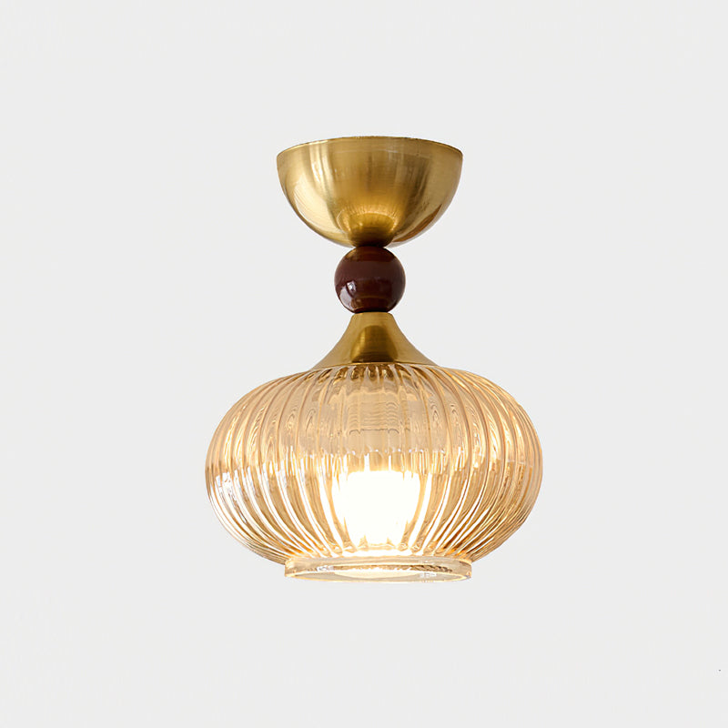 Lifestyle image of the Kaydan Ceiling Lamp in a cozy bedroom setting.