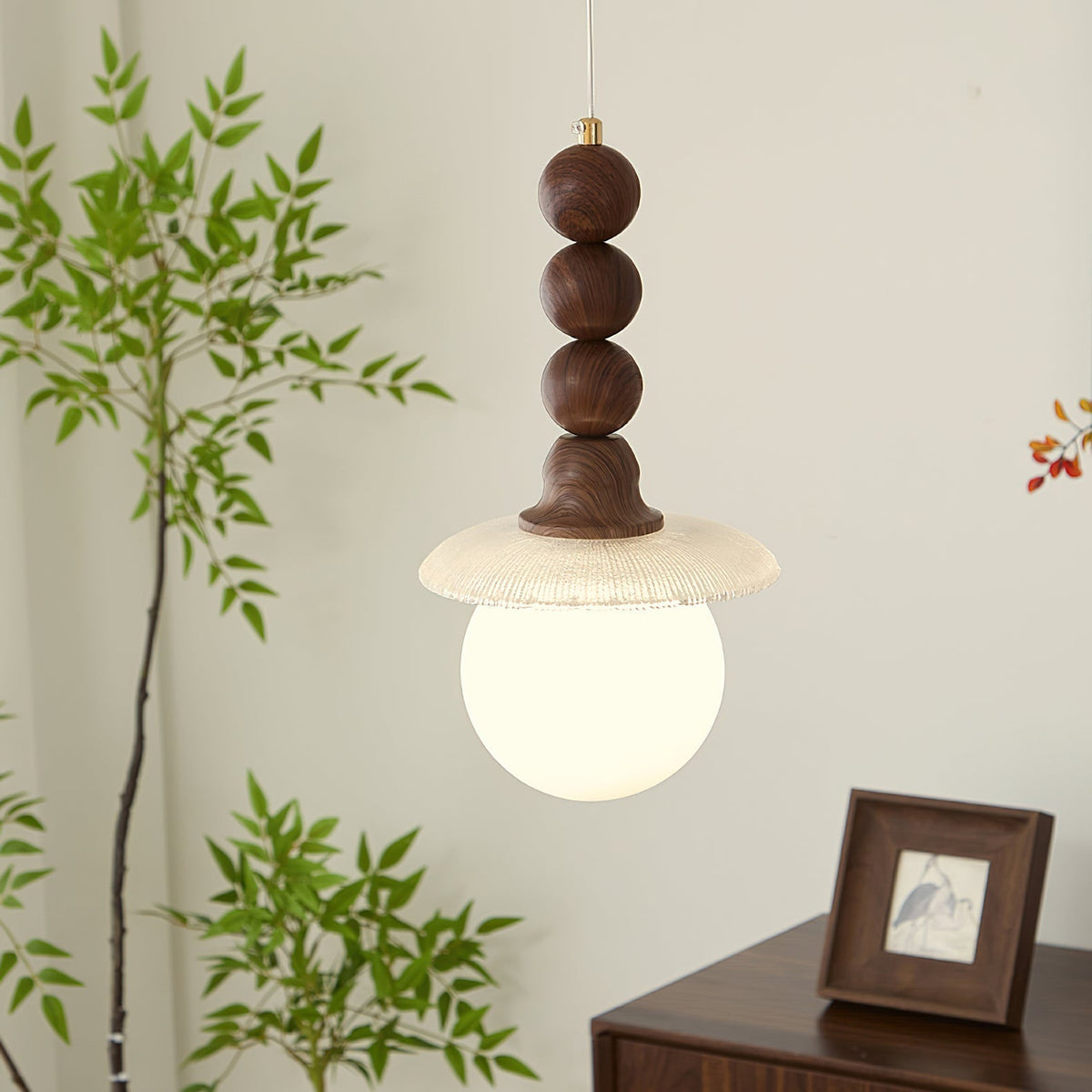 Close-up of the Kaydan Pendant Lamp's white ribbed glass shade.