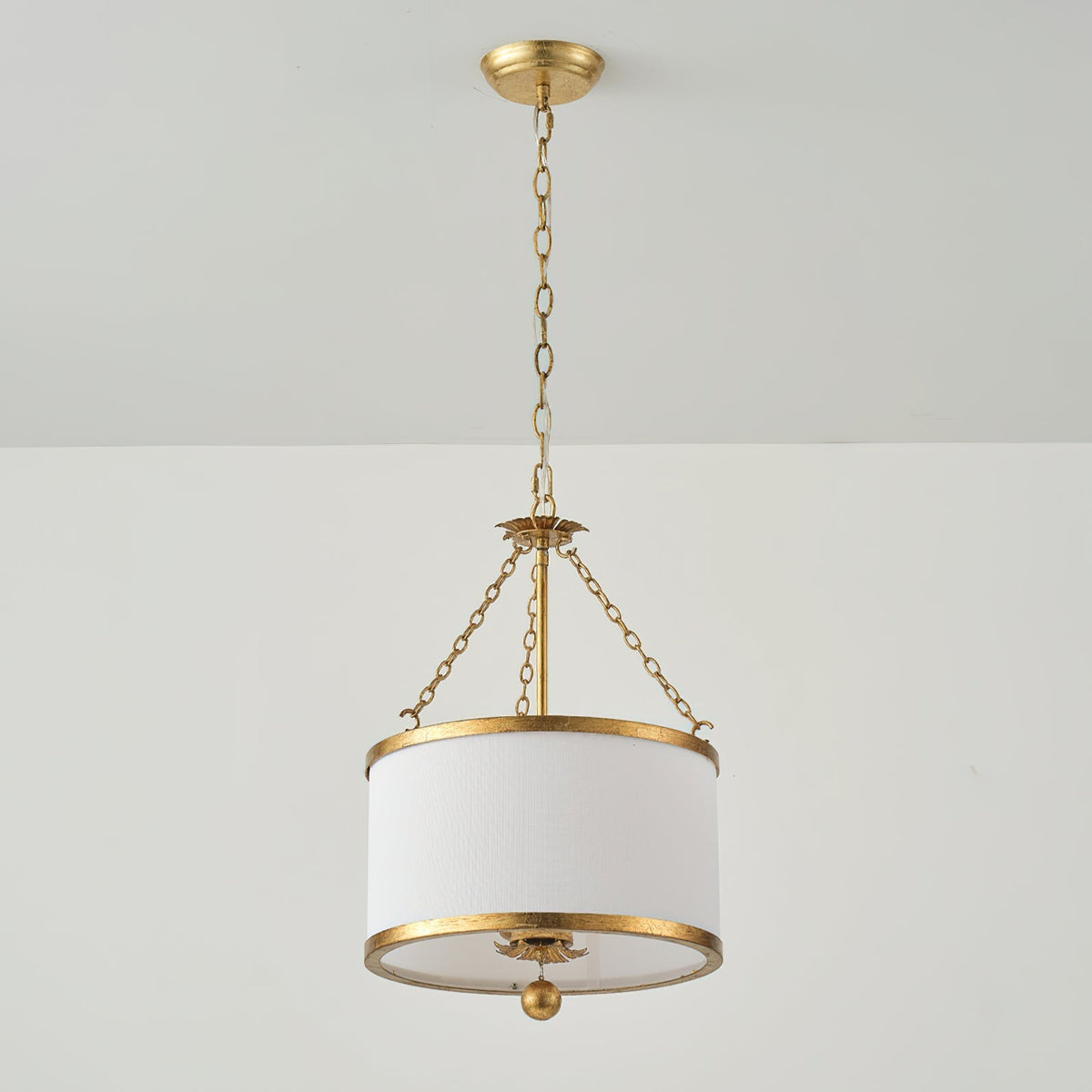 The Kian Pendant Light illuminated, casting a warm and inviting glow.