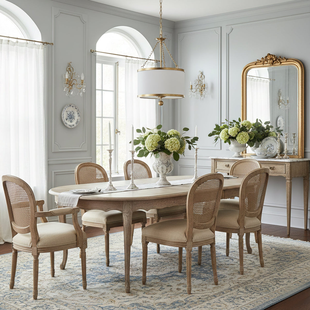 Kian Pendant Light in silver, reflecting light beautifully.