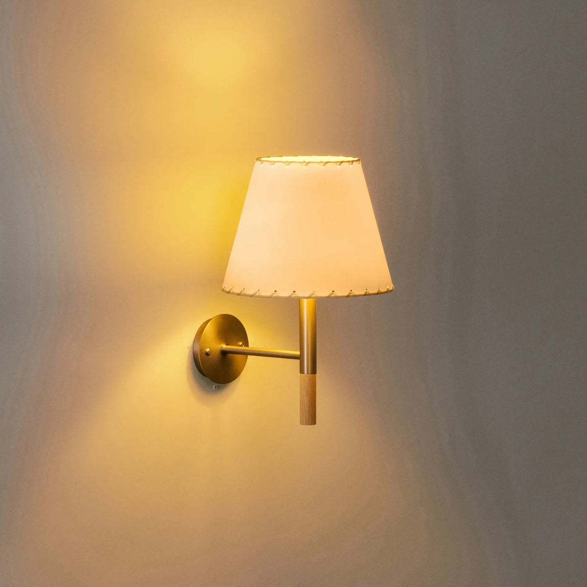 Kilkee Wall Lamp with a beige fabric shade and nickel finish.