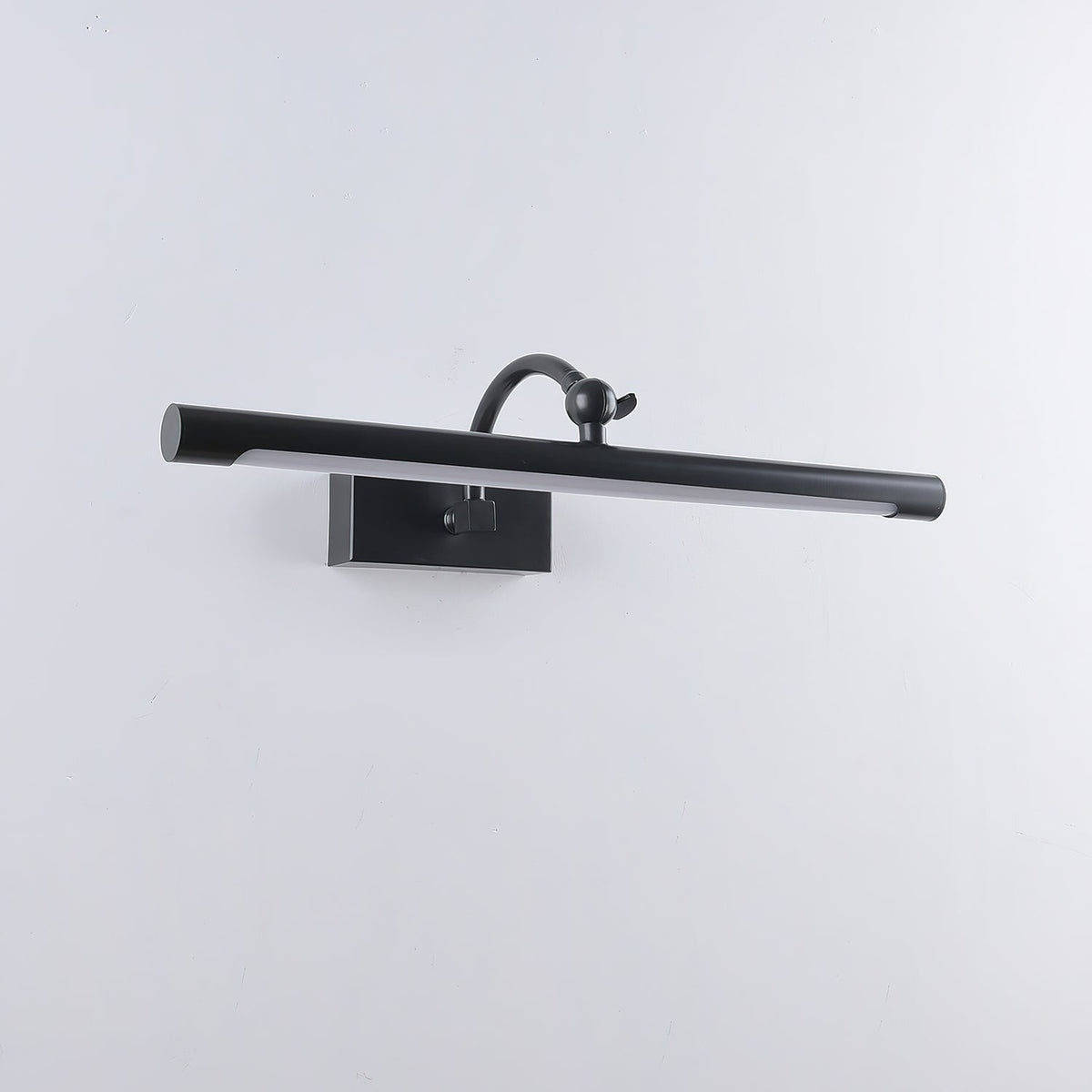 The Kingsbury sconce used as a picture light above framed artwork.