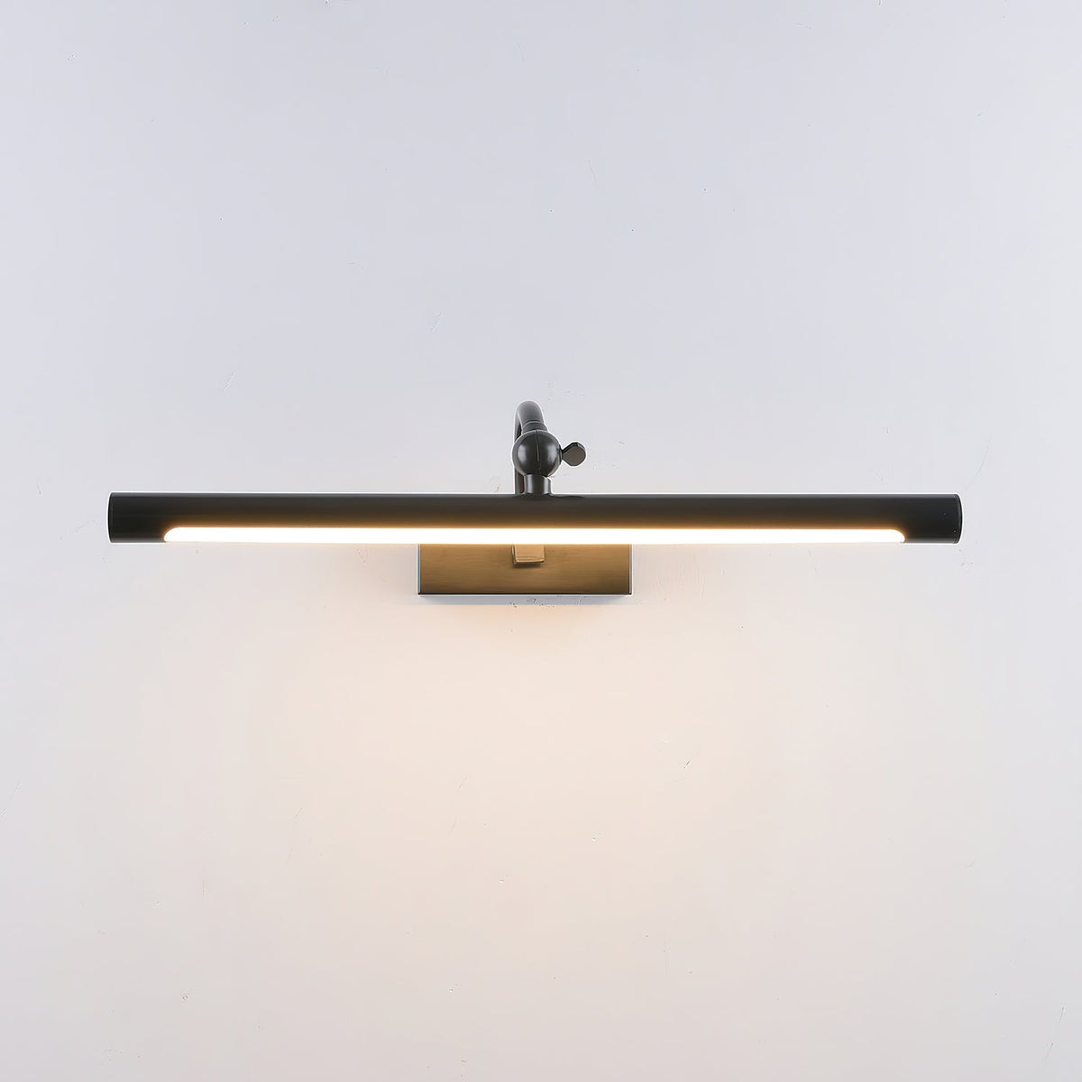 The wall mounting plate and hardware of the Kingsbury sconce.