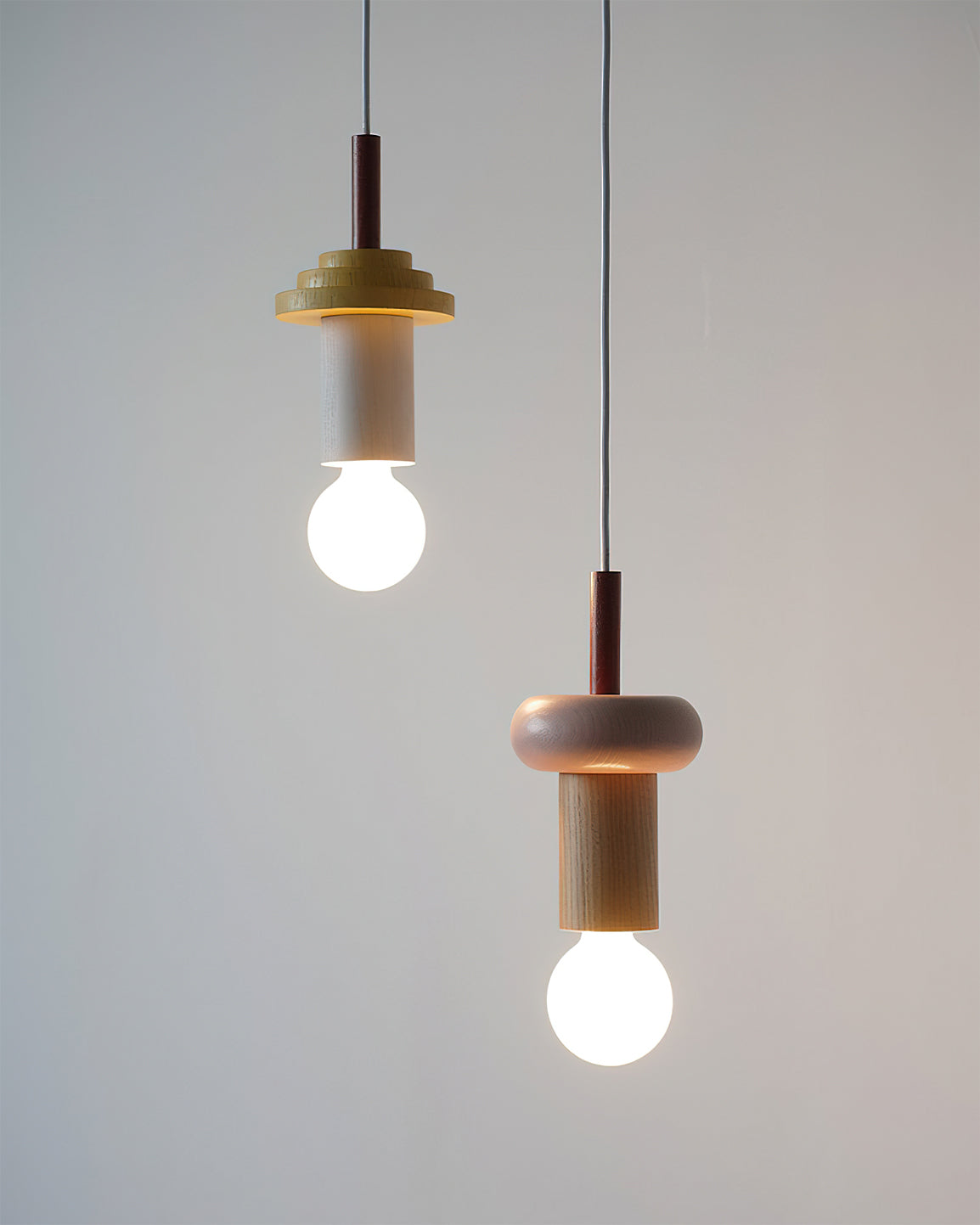 The Vanya pendant light turned on, casting a warm and inviting glow.