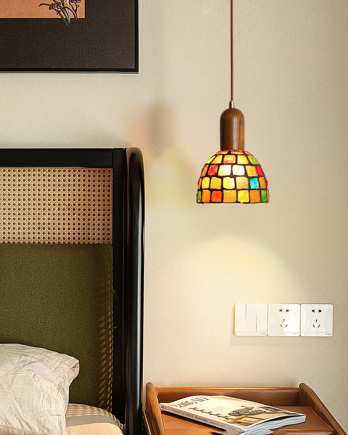 The 3-light Klima Pendant Light installed over a modern kitchen island.