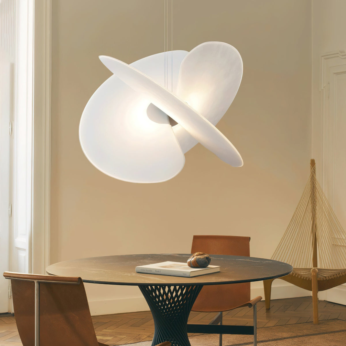 The light shown against a dark wall to emphasize its luminosity.