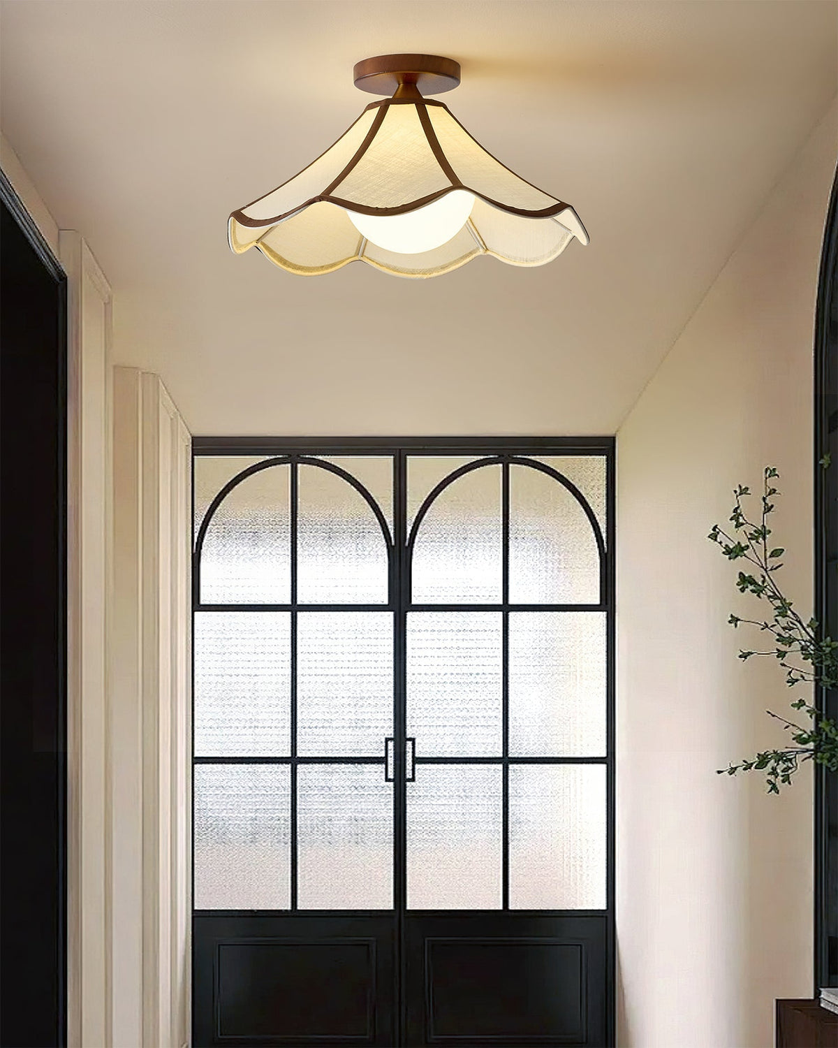 View from below of the illuminated Lonzo Ceiling Light.
