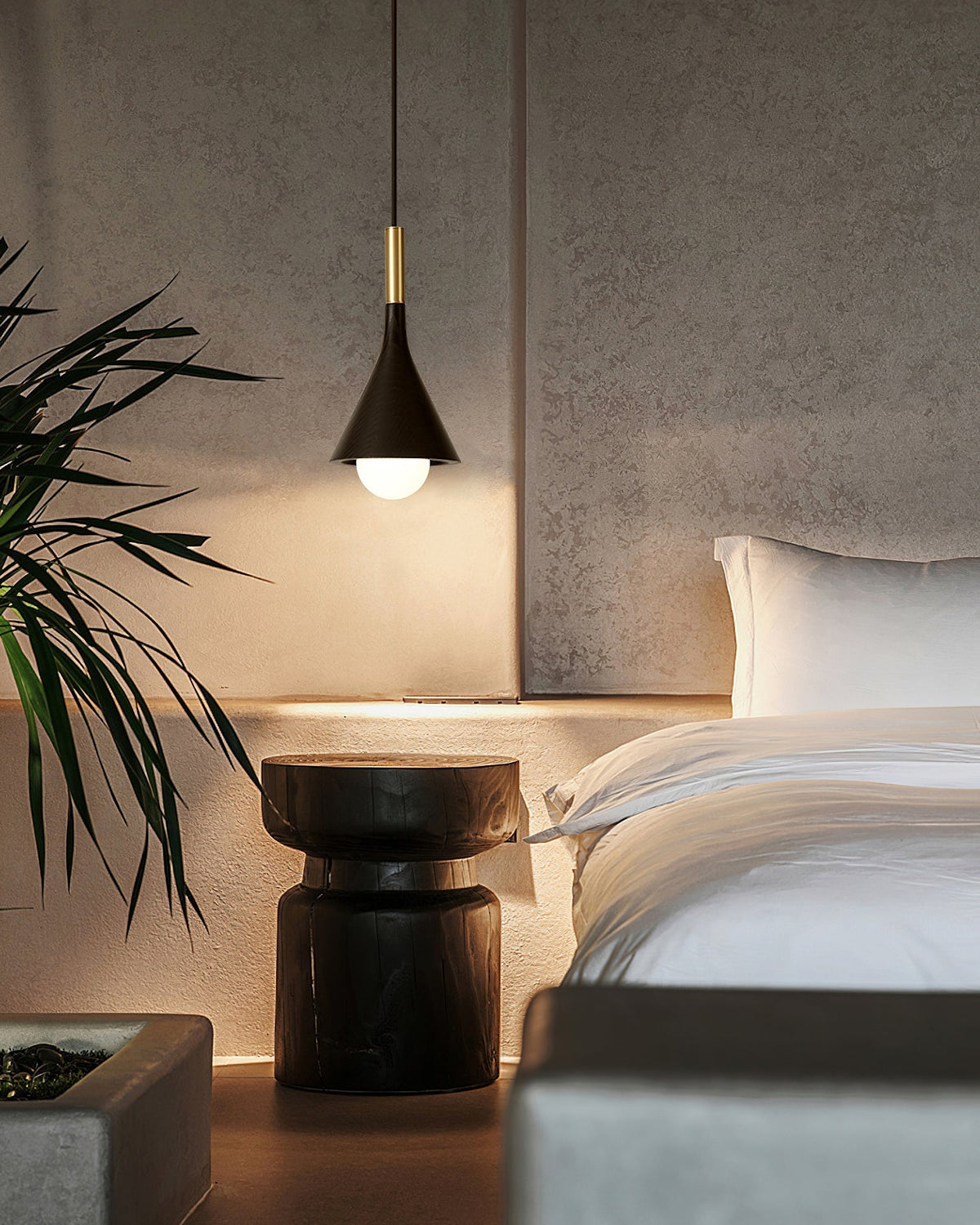 The Lucian Pendant Lamp illuminated, casting a warm glow.