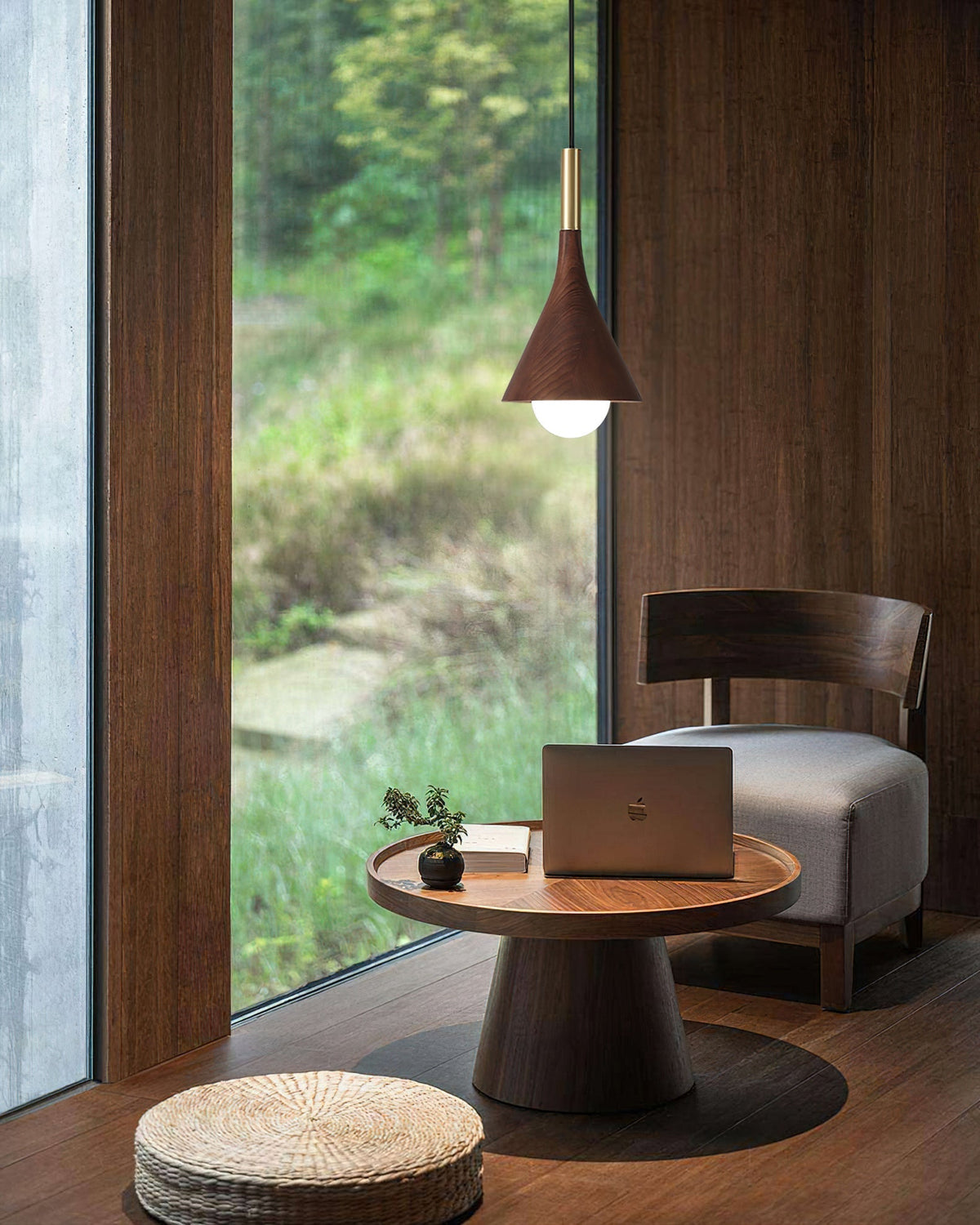 Close-up of the wood grain and brass detail on the Lucian Pendant Lamp.