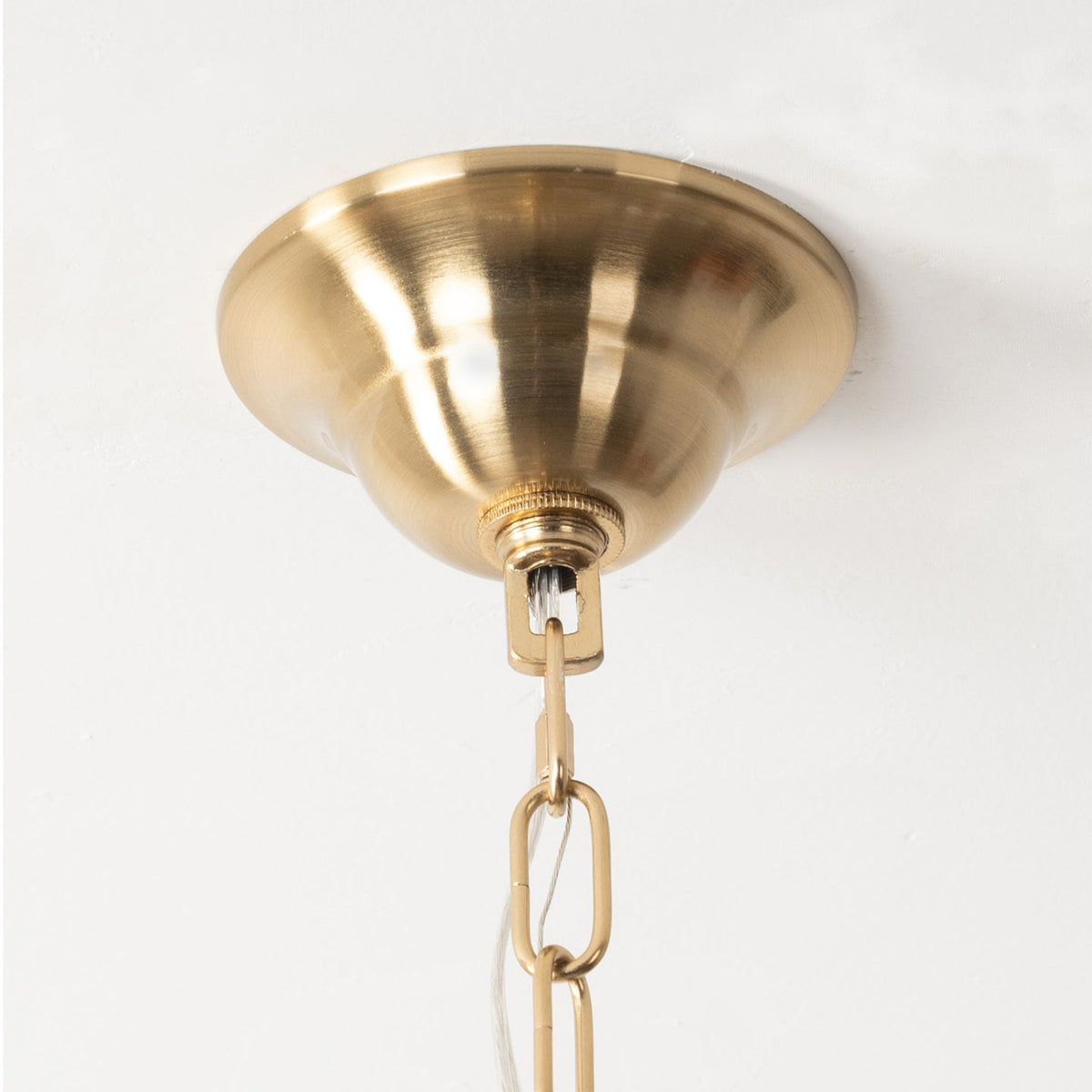 Full product shot of the gold Lucille Crystal Pendant Light.