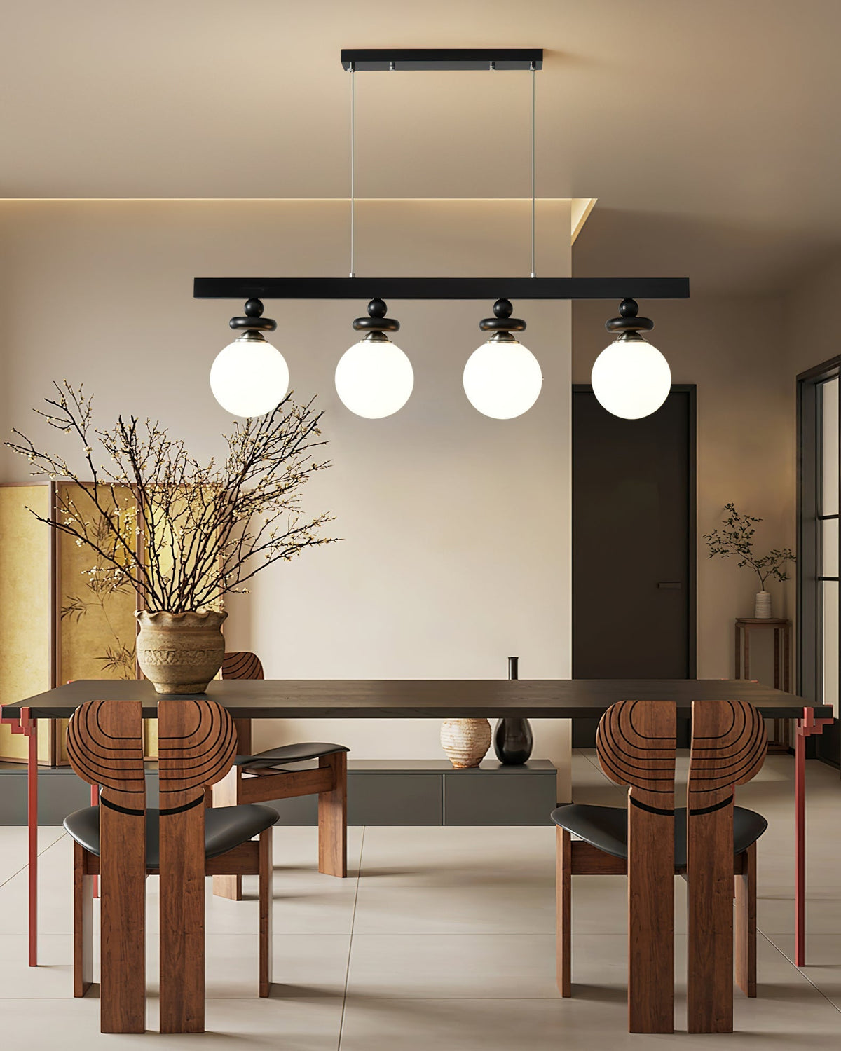 A single Maru Pendant Light illuminating a cozy living room corner.