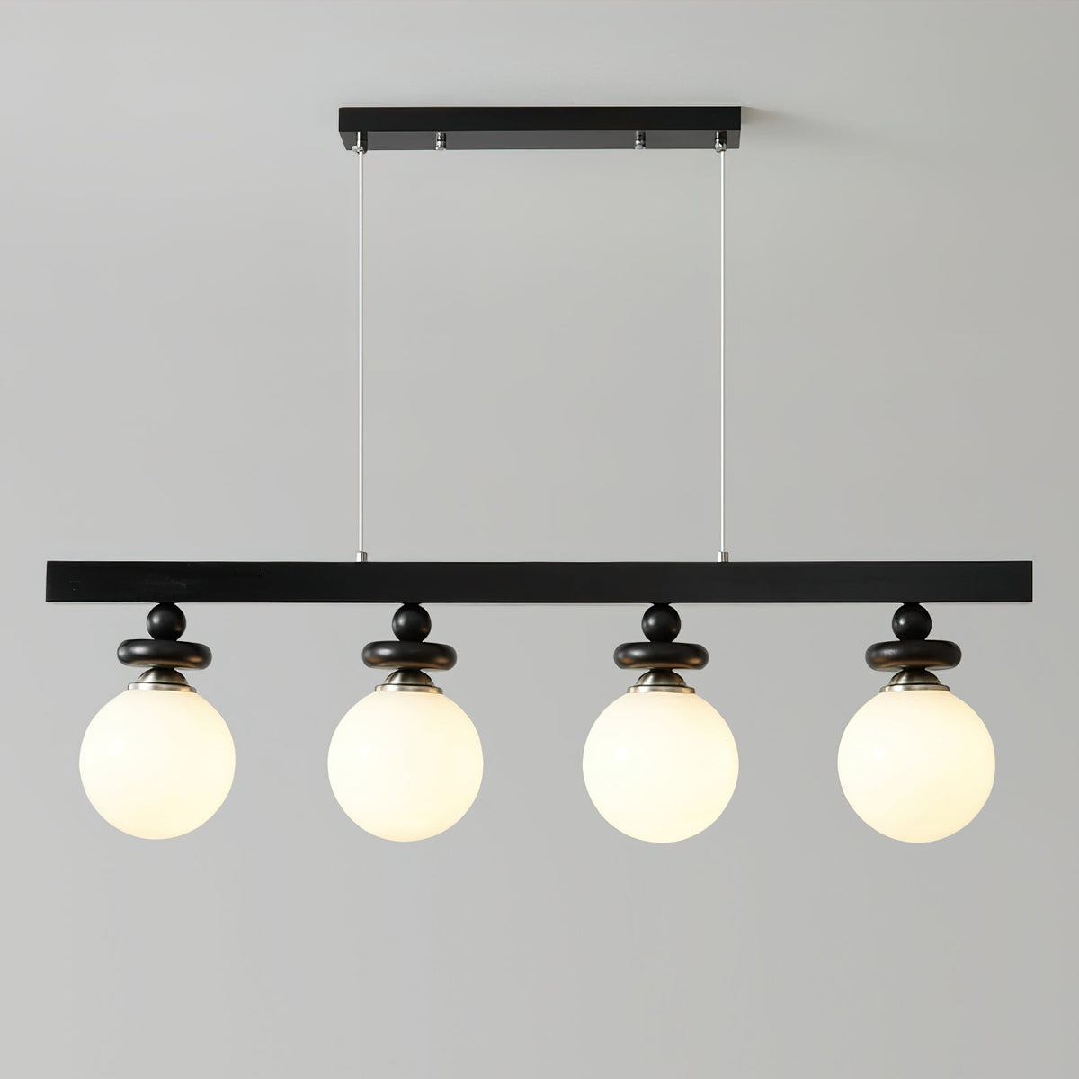 Full product shot of the single Maru Pendant Light on a white background.