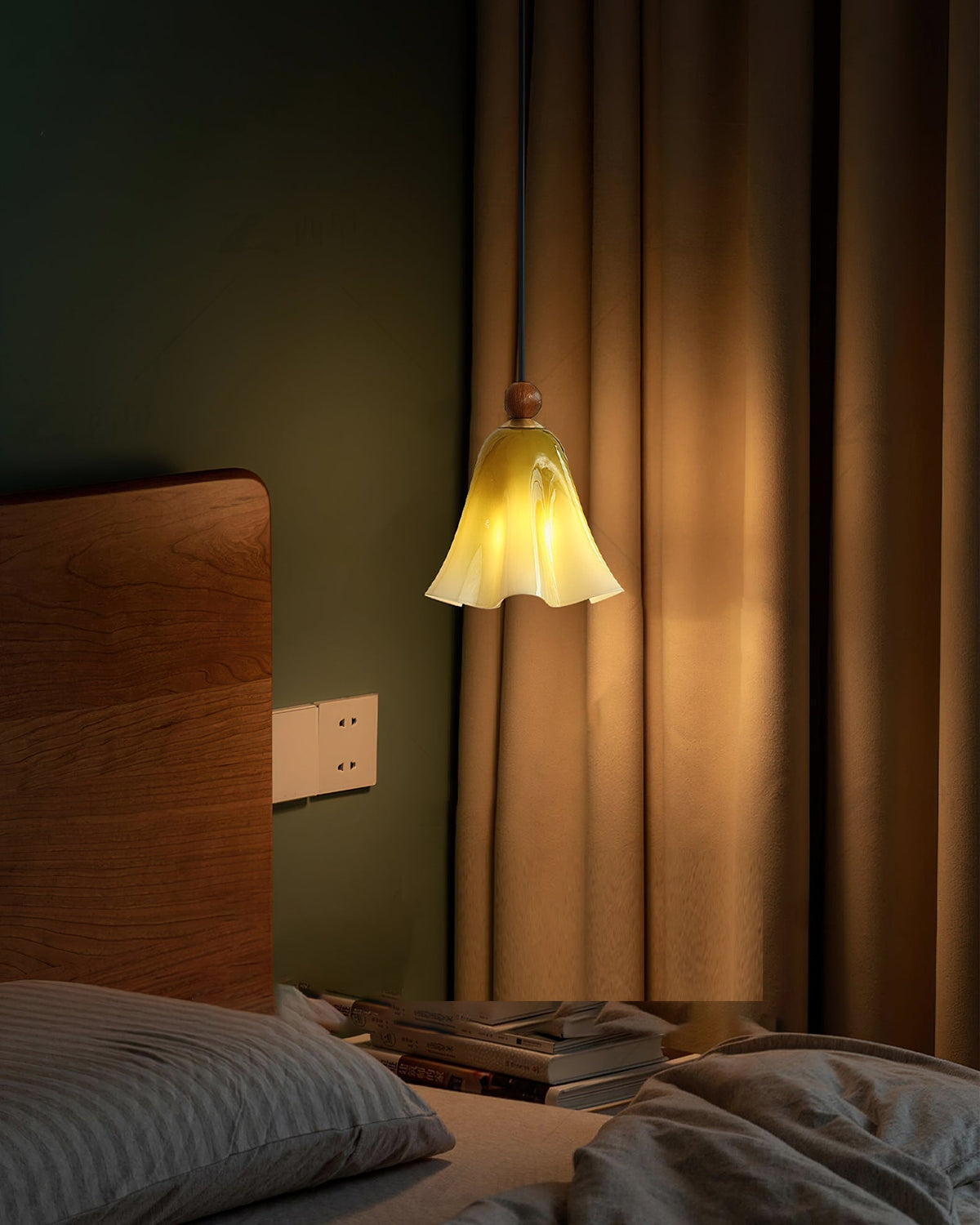 Meblo Pendant Light hanging over a dining table.
