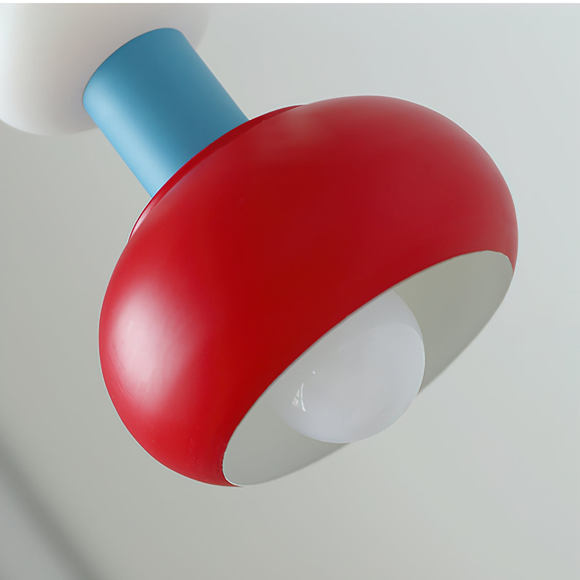 Close-up on the red section of the pendant light.