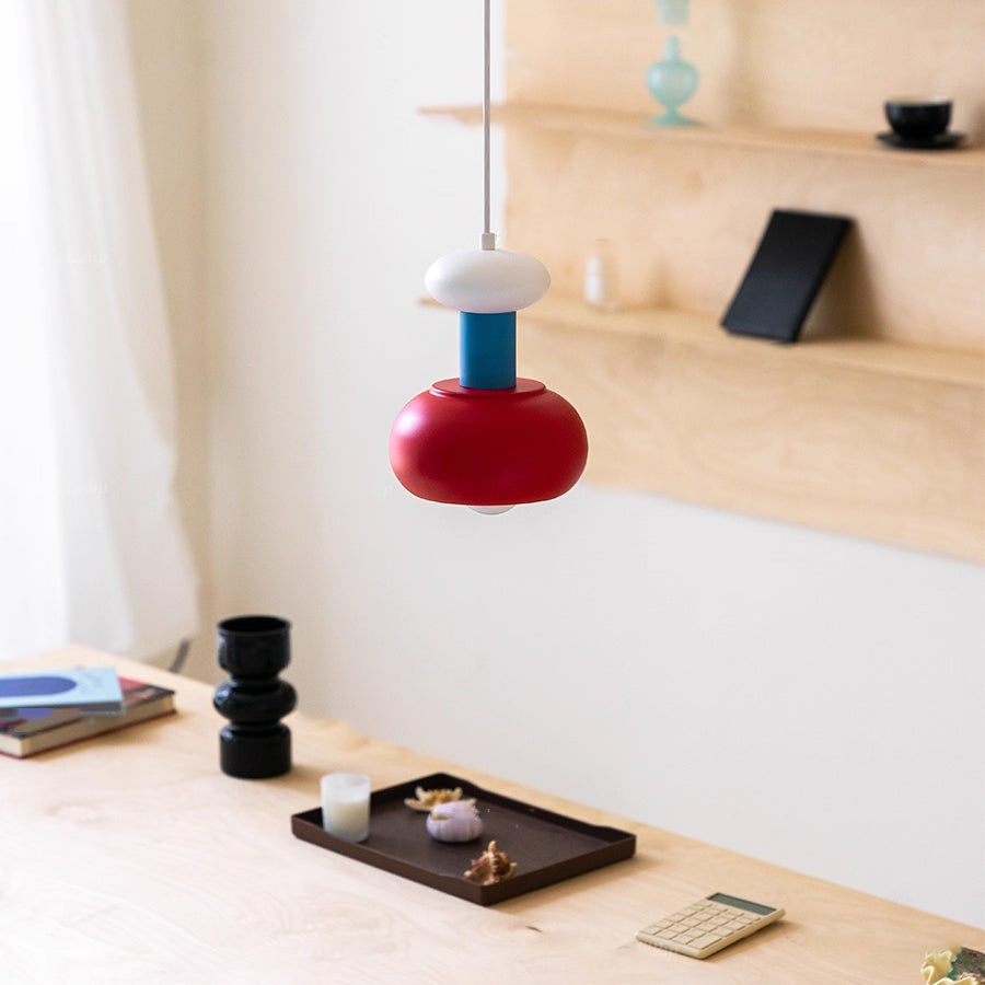 Close-up of the Meli Pendant Light's metal construction and color blocks.