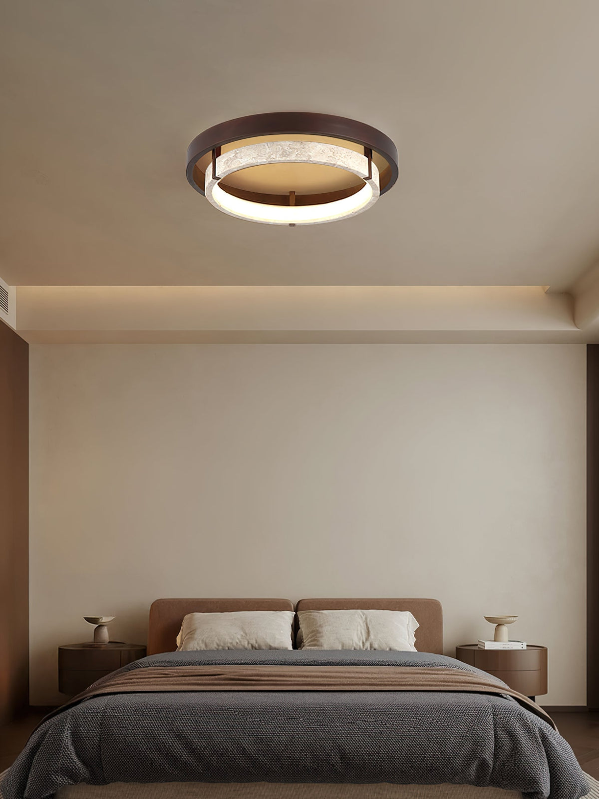 The Menine Ceiling Light providing a warm glow in a bedroom.