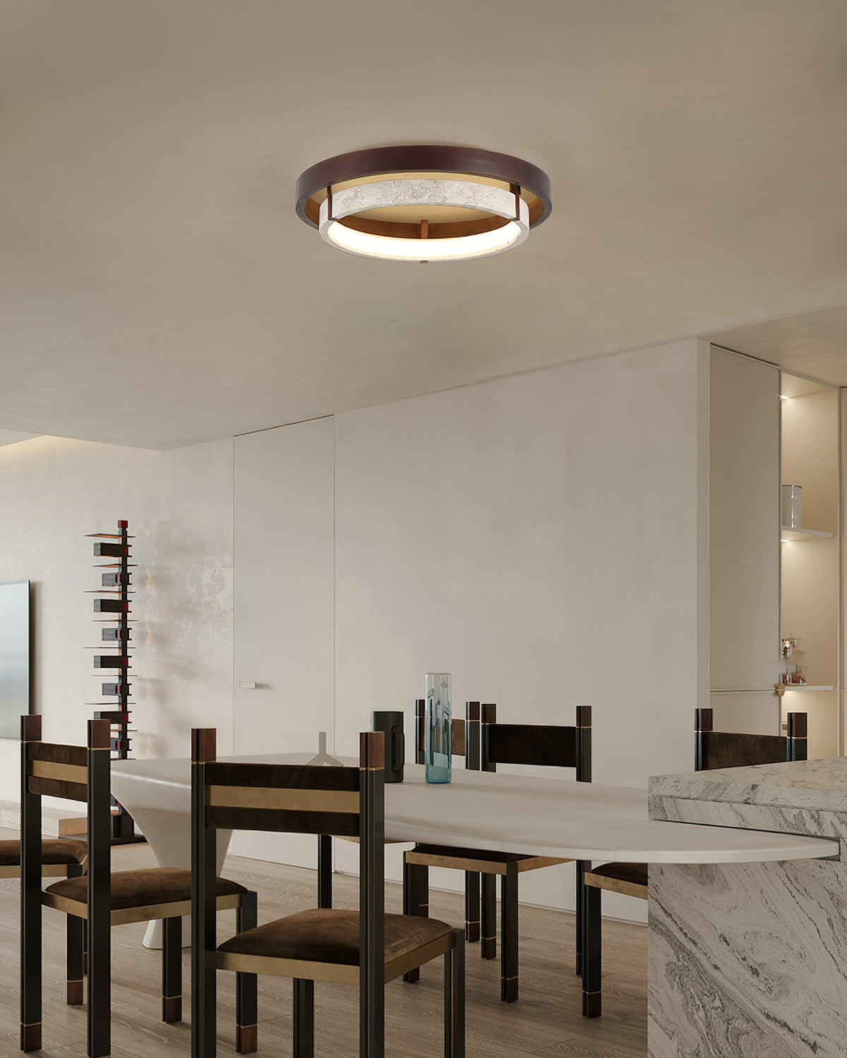 The circular ceiling light installed in a modern living room.