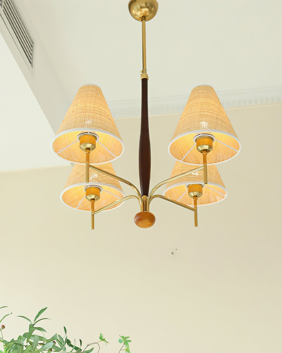 Lifestyle image of the Mercer Chandelier in a well-decorated entryway.