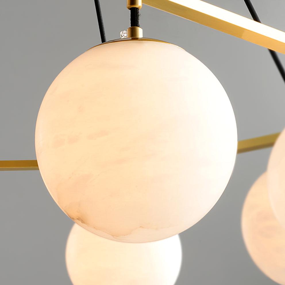 Side profile of the Miira Alabaster Chandelier against a neutral wall