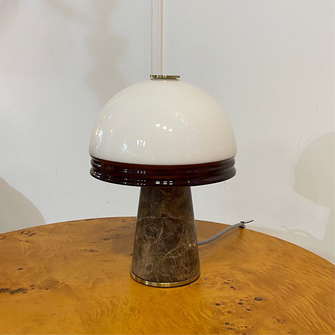 Close-up of the unique natural patterns on the Milano Table Lamp's marble base.