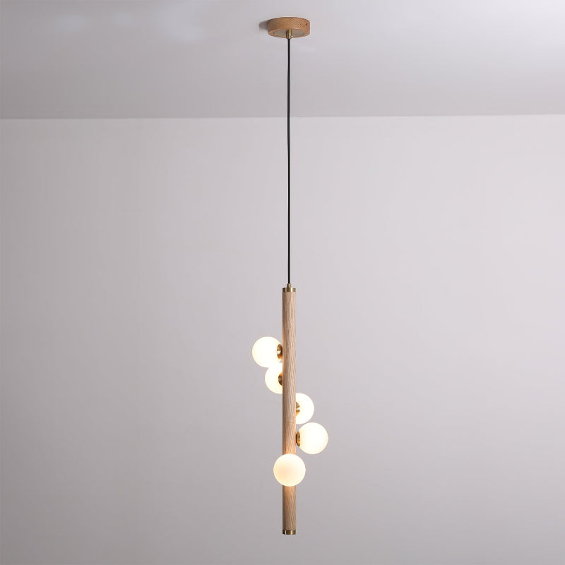 Miller Pendant Light against a dark background to highlight its form.