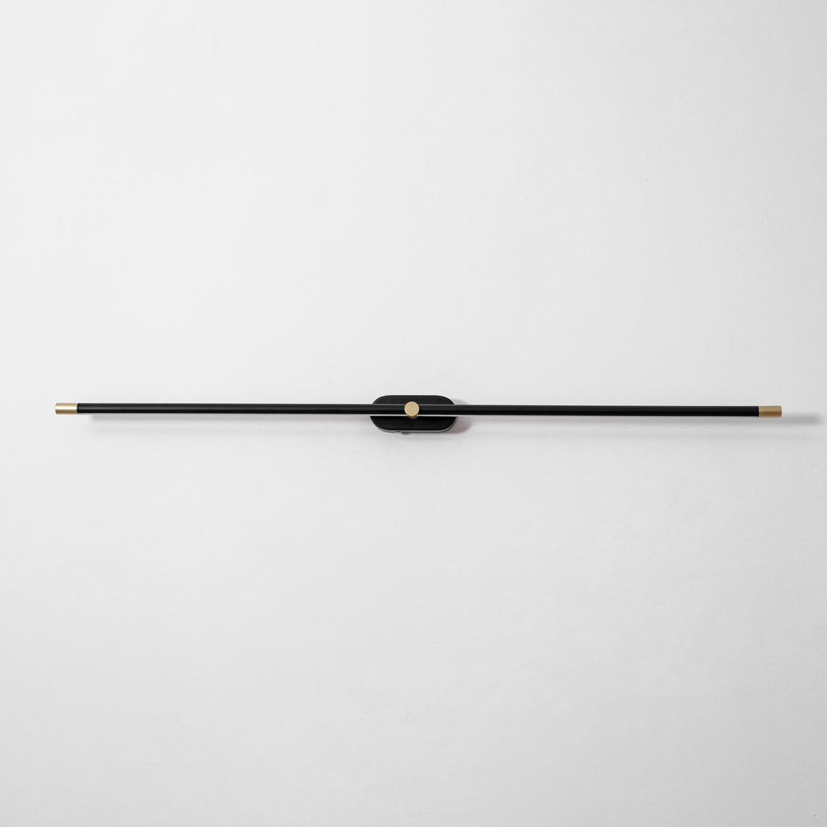 The lamp's light reflecting off a dark wall.