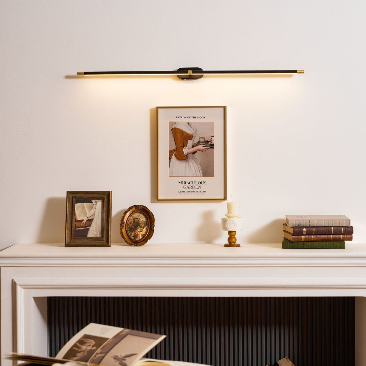 Rechargeable wall lamp being charged with a USB-C cable.